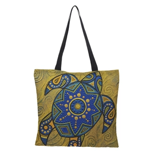 Detailed close-up of 3D sea turtle print and fabric texture on a linen tote bag