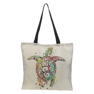 Close-up of artistic 3D sea turtle print on waterproof linen shopping tote bag with handles