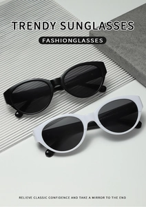 Vue détaillée des lunettes de soleil œil de chat ovales polarisées en noir et blanc