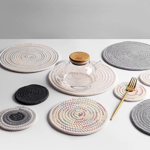 Handwoven round cotton placemats and coasters set in multiple colors for heat insulation