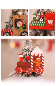 Detailed view of vintage wooden Christmas train ornaments with snowman and Santa carvings