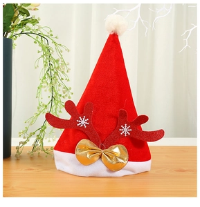 Bonnet de Noël rouge festif avec des bois de renne pailletés et un joli nœud doré décoratif