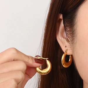 Minimalist oval gold chunky hoop earrings with high-polished stainless steel finish