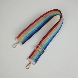 Adjustable rainbow striped bag strap with shiny gold swivel hooks and metal buckle