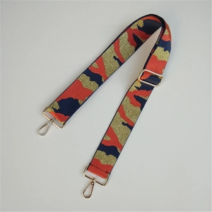 Close-up of 5cm wide jacquard camo strap with gold metallic threads and lobster clasps