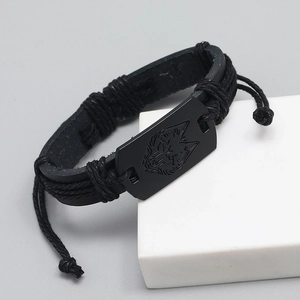 Men's punk leather bracelet with black wolf head charm and multilayer braided cord