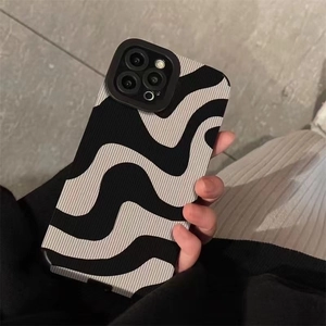 Minimalist black and white wavy zebra stripe iPhone case with non-slip texture