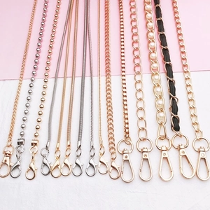 Selection of metal bag straps and chains with lobster clasps in various textures
