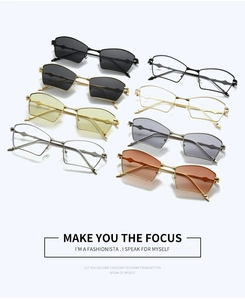 Detailed overhead view of eight assorted metallic rectangular sunglasses with wavy temples