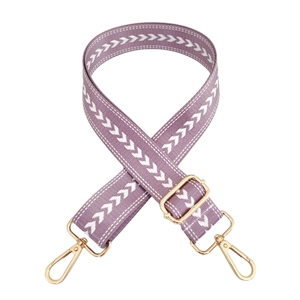 Close-up of adjustable purple nylon shoulder strap with white chevron arrow patterns