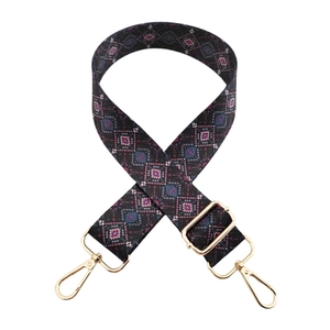 Ethnic wide woven bag strap with colorful geometric diamond pattern and gold hardware