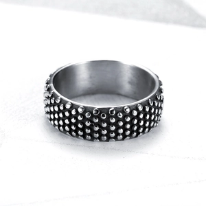 Vintage silver stainless steel ring featuring detailed circular bead texture for men