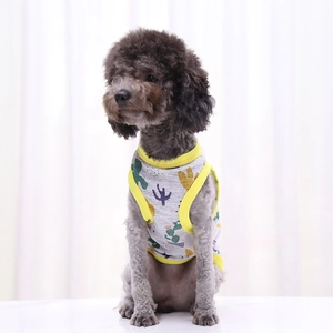 Detail of light gray pet summer vest with yellow trim and cartoon cactus print