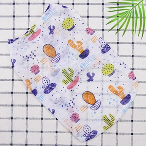 Detail of lightweight breathable pet vest with colorful cactus print on white mesh fabric