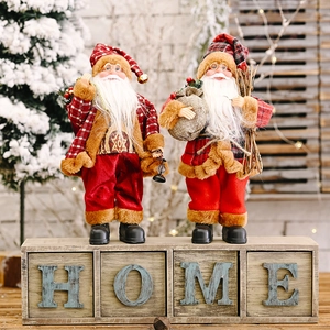 Standing Santa Claus figurines with red plaid outfits and sack for Christmas decor