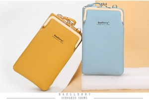 Close-up of litchi pattern leather cell phone crossbody bags with vintage metal clasps