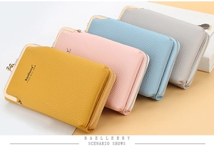 Vertical phone wallets in four colors showing litchi grain texture and kiss-lock closure