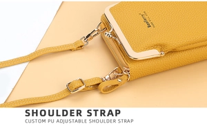 Detail of yellow lychee grain PU leather phone bag with adjustable shoulder strap and buckle
