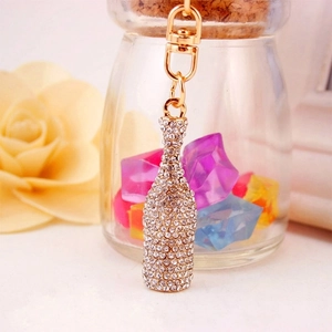 Sparkling crystal encrusted wine bottle keychain in gold metal finish for handbags