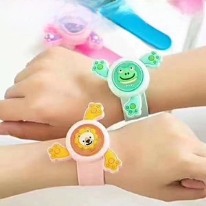 Close-up of silicone luminous mosquito repellent bracelet with spinning cartoon frog