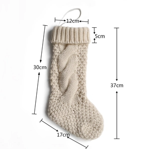 Detailed dimension guide for cream cable knit Christmas stocking with metric measurements