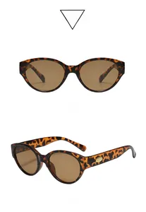 Vues de face et de côté de lunettes de soleil œil de chat vintage avec détails dorés