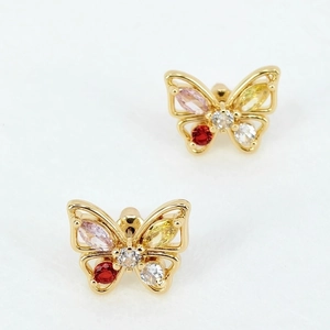 Close-up of golden butterfly earrings featuring colorful marquise-cut zircon stones