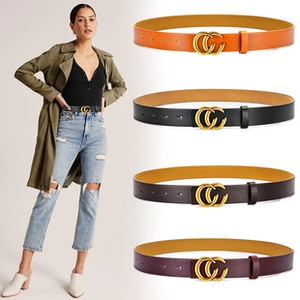 Detail of four colorful leather belts featuring gold double-C buckles for women