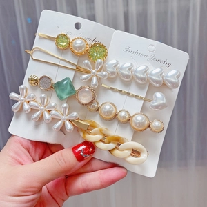 8-piece set of Korean style pearl and acrylic hair clips in gold and green tones