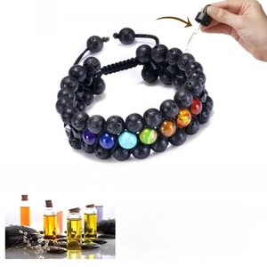 Handmade 7 chakra lava stone bracelet with adjustable braided rope and oil diffuser beads