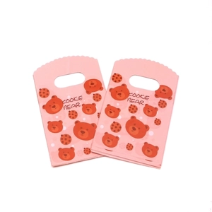 Pink mini plastic gift bag with Cookie Bear print for jewelry storage and small packaging