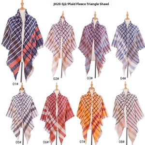 Detail of checkered triangle scarf with tassels in various colors for women