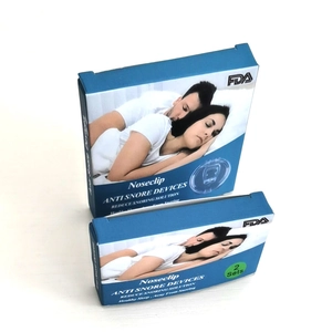 Two sets of magnetic silicone nose clips for anti-snoring in original blue packaging