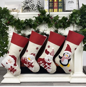 Set of 4 large Christmas stockings with 3D Santa and Reindeer hanging on a fireplace