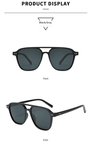 Front and side views of vintage square black sunglasses with metal dot rivets and gray lenses