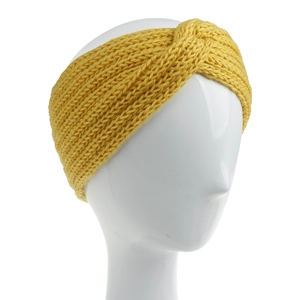 Close-up of yellow knitted headband with cross twist design on a white mannequin head