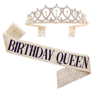 Close-up of sparkling gold Birthday Queen sash and rhinestone crown for 30th birthday party