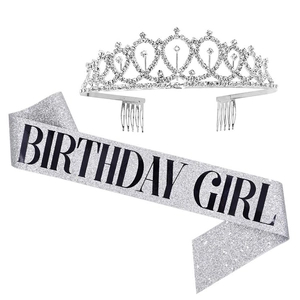 Detail of silver rhinestone crown and silver glitter sash with Birthday Girl text
