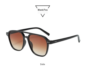 Side view of retro oversized square sunglasses with black frame and tea gradient lenses