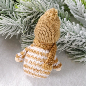 Brown and white knitted snowman doll ornament for Christmas tree decor with wool texture