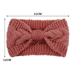 Dusty pink cable knit headband with bow design, dimensions 21cm by 12cm, winter ear warmer