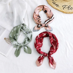 Three elegant 53cm silk square scarves with floral and animal prints on white fabric