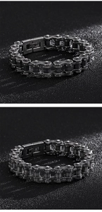 Macro shot of industrial punk bike chain bracelet with vintage black brushed steel finish