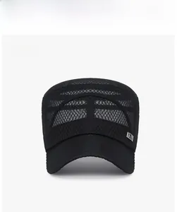 Detail of black breathable mesh flat top hat featuring a rectangular metal logo on the side
