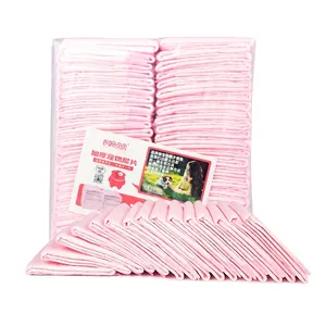 Pink absorbent pet training pads with diamond embossed surface in 100 count pack