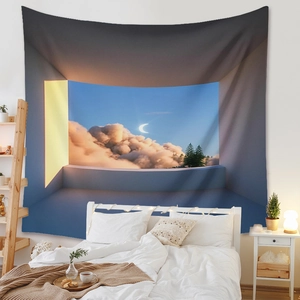 Detail of bohemian tapestry featuring surreal cloud and moon landscape over a cozy bed