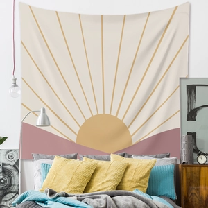 Detail of bohemian tapestry featuring a geometric sun design on a bedroom wall background