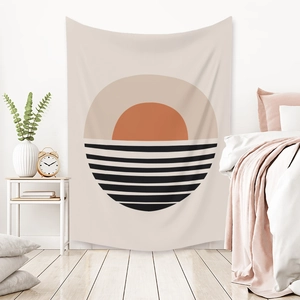 Detail view of Bohemian wall tapestry with abstract sunset patterns in a cozy bedroom decor
