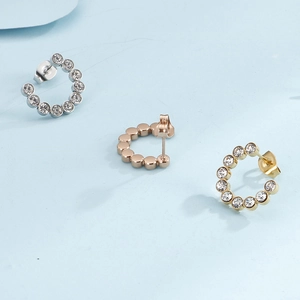 Fashion C-shaped diamond earrings set in silver, gold, and rose gold finishes