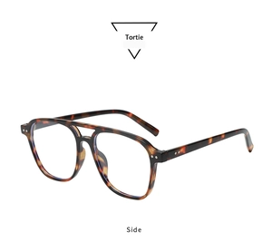 Detailed side view of vintage double bridge tortoise square frame sunglasses with metal studs